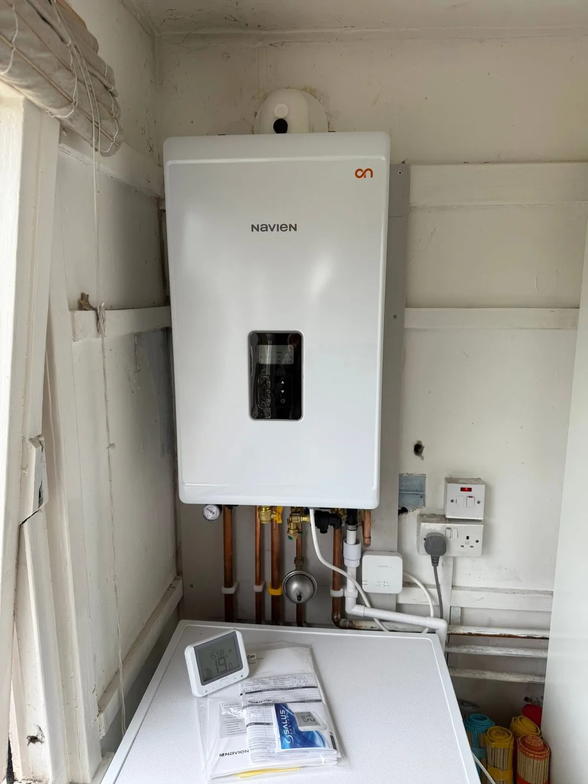 Boiler fitted inside a cupboard