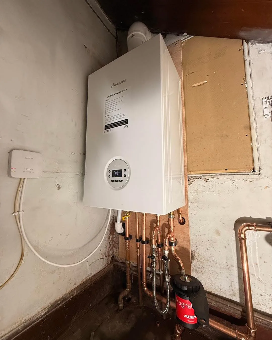Boiler installation in a utility space